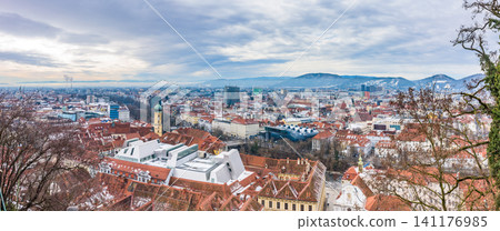 A panoramic view of the World Heritage site of Graz's Old Town and the Kunsthaus from Schlossberg Hill. A panoramic view of the World Heritage site of Graz's Old Town and the Kunsthaus from Schlossberg Hill. 141176985