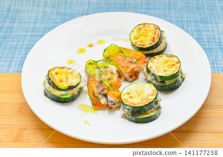 Stuffed zucchini and zucchini flowers Stuffed zucchini and zucchini flowers 141177238
