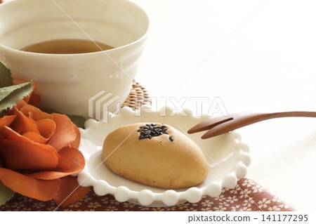 Sweet potato sweets and Japanese tea Sweet potato sweets and Japanese tea 141177295