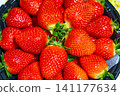 Fresh ripe organic strawberry in a dark plate 141177634