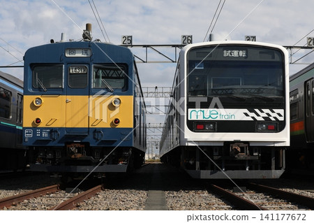 209 series MUE-Train and Kumoya 143-11 lined up at Kawagoe Train Depot 141177672