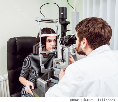 Slit lamp examination. Biomicroscopy of the anterior eye segment. Basic eye examination. Slit lamp examination. Biomicroscopy of the anterior eye segment. Basic eye examination. 141177823