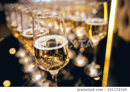 Row of glasses of wine. A restaurant. Row of glasses of wine. A restaurant. 141178104