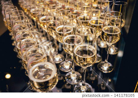 Row of glasses of wine. A restaurant. Row of glasses of wine. A restaurant. 141178105