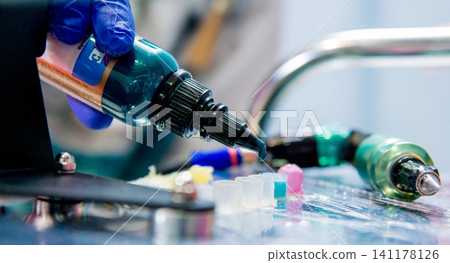 Professional tattooist Professional tattooist 141178126