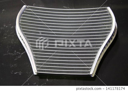 Maximizing cooling surface area within the limited space inside the fairing... A radiator for motorcycles. 141178174
