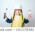 Little girl on the white background. Construction 141178382