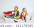 Little girls on the white background. Construction 141178385