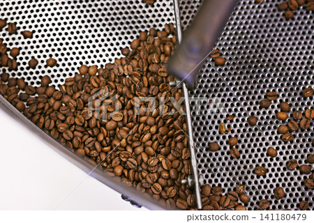 Coffee beans, machine and industry in factory for roast, grinding or product for flavor, export or quality assurance. Plant, metal container and manufacturing for organic caffeine with sustainability Coffee beans, machine and industry in factory for roast, grinding or product for flavor, export or quality assurance. Plant, metal container and manufacturing for organic caffeine with sustainability 141180479