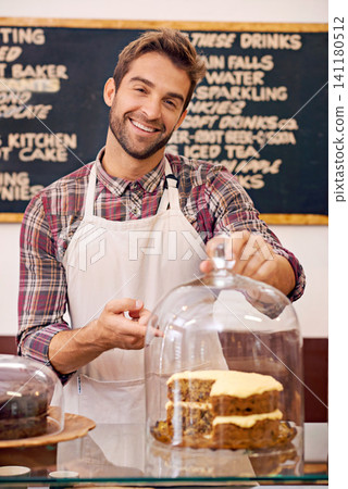 Man, waiter and cake on counter in cafe for display, service or catering with smile in portrait. Person, barista or business owner in coffee shop, bakery or diner with pride, show and point in Italy Man, waiter and cake on counter in cafe for display, service or catering with smile in portrait. Person, barista or business owner in coffee shop, bakery or diner with pride, show and point in Italy 141180512