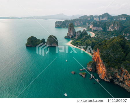 Aerial panorama of Railay Beach with towering limestone karsts a 141180607
