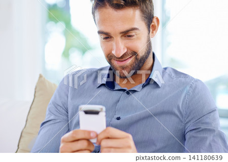 Businessman, phone and typing an email in home, communication and networking for company. Male person, freelancer and reading a notification on app for conversation, website and internet for info Businessman, phone and typing an email in home, communication and networking for company. Male person, freelancer and reading a notification on app for conversation, website and internet for info 141180639