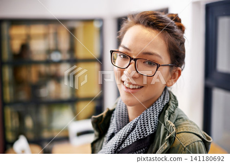 Happy woman, portrait and creative with glasses for career ambition or confidence at the office. Face of smart female person, employee or designer with smile for startup, mindset or positive attitude Happy woman, portrait and creative with glasses for career ambition or confidence at the office. Face of smart female person, employee or designer with smile for startup, mindset or positive attitude 141180692
