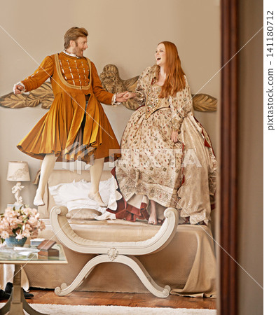 Royal, man and woman in renaissance with luxury, silly and happiness with fun together for wedding night. Bedroom, king and queen with smile for marriage, laughing and girl with husband in palace Royal, man and woman in renaissance with luxury, silly and happiness with fun together for wedding night. Bedroom, king and queen with smile for marriage, laughing and girl with husband in palace 141180712
