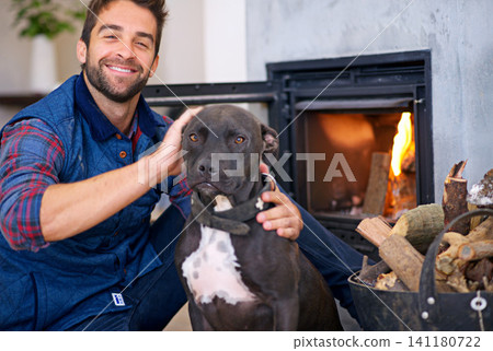 Fireplace, dog and portrait of man in home with fire for heat, warmth and light in winter. Flame, wood and person with pet bonding with firewood for comfort, cozy and relaxing house in living room Fireplace, dog and portrait of man in home with fire for heat, warmth and light in winter. Flame, wood and person with pet bonding with firewood for comfort, cozy and relaxing house in living room 141180722