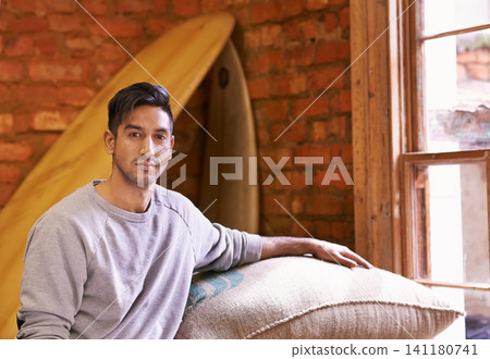 Man, warehouse and portrait with bag for coffee beans, quality assurance or pride with product for export. Entrepreneur, caffeine and trading with organic process, supply chain or factory for storage 141180741