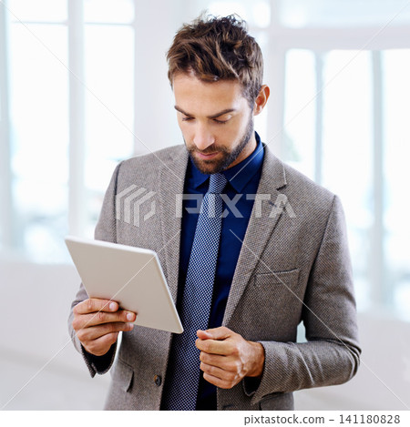 Tablet, read and formal businessman in office, web design and online project or website. Corporate, network and internet for research or planning with male person, strategy and startup workplace Tablet, read and formal businessman in office, web design and online project or website. Corporate, network and internet for research or planning with male person, strategy and startup workplace 141180828
