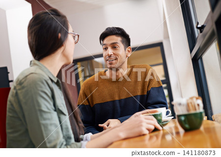 Restaurant, morning and couple on date with coffee in conversation, talking and chatting for bonding. Love, happy and man and woman with caffeine, cappuccino or beverage in diner, cafe and store Restaurant, morning and couple on date with coffee in conversation, talking and chatting for bonding. Love, happy and man and woman with caffeine, cappuccino or beverage in diner, cafe and store 141180873