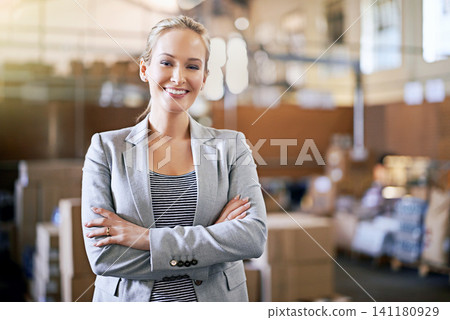 Boxes, portrait and business woman in factory with smile for wholesale, logistics or distribution. Export, commerce and service manager at cargo storage warehouse with confidence, pride and smile Boxes, portrait and business woman in factory with smile for wholesale, logistics or distribution. Export, commerce and service manager at cargo storage warehouse with confidence, pride and smile 141180929