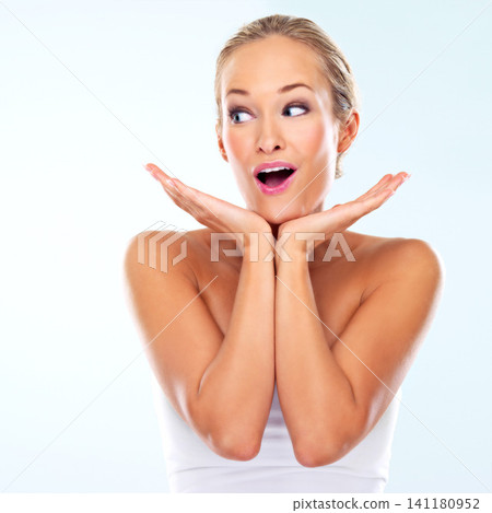 Hands, wow and woman with makeup, cosmetics and skincare with expression on mockup isolated on white background. Female person, lady and face for glow, cleansing and treatment on studio backdrop Hands, wow and woman with makeup, cosmetics and skincare with expression on mockup isolated on white background. Female person, lady and face for glow, cleansing and treatment on studio backdrop 141180952