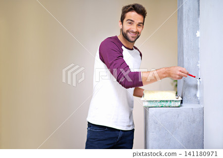 Painting, happy and portrait of man in home for renovation, remodeling and maintenance in house. Interior design, construction and person with paintbrush, roller and white paint for DIY project Painting, happy and portrait of man in home for renovation, remodeling and maintenance in house. Interior design, construction and person with paintbrush, roller and white paint for DIY project 141180971