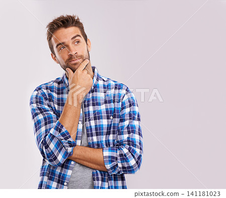Man, thinking and vision idea in studio for future thoughts with brainstorming solution, problem solving or white background. Male person, hand and planning question for decision, wondering or mockup Man, thinking and vision idea in studio for future thoughts with brainstorming solution, problem solving or white background. Male person, hand and planning question for decision, wondering or mockup 141181023