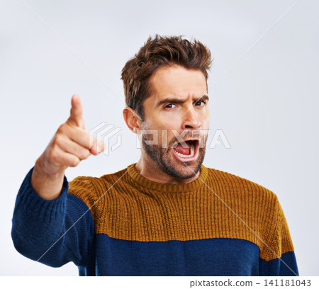 Frustrated man, portrait and pointing to you with shout for choice, pick or rage on a white studio background. Angry male person or upset model yelling or screaming with mood or attitude on mockup Frustrated man, portrait and pointing to you with shout for choice, pick or rage on a white studio background. Angry male person or upset model yelling or screaming with mood or attitude on mockup 141181043