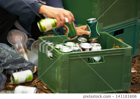 Liquor, person and hands with drinks, beer and beverage product for drinking a can in party. Closeup, outdoor or tin container for liquid, alcohol or crate in case package on ground or floor by trash Liquor, person and hands with drinks, beer and beverage product for drinking a can in party. Closeup, outdoor or tin container for liquid, alcohol or crate in case package on ground or floor by trash 141181606