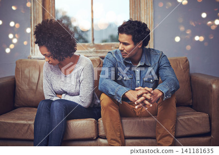 Couple, couch and marriage fight or cheating problem for dating breakup, annoyed or divorce. Man, woman and unhappy stress on sofa with sad argument for disappointed mistake, confession or conflict Couple, couch and marriage fight or cheating problem for dating breakup, annoyed or divorce. Man, woman and unhappy stress on sofa with sad argument for disappointed mistake, confession or conflict 141181635