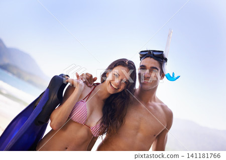 Portrait, smile and couple at beach for snorkeling on holiday, vacation or travel together on mockup space in summer. Face, man and woman at ocean for adventure in nature and happy with diving gear Portrait, smile and couple at beach for snorkeling on holiday, vacation or travel together on mockup space in summer. Face, man and woman at ocean for adventure in nature and happy with diving gear 141181766