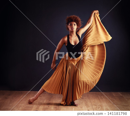 Contemporary, dancer and woman for dancing in studio with performance, training or practice lesson for art. Black person, skirt or choreographer routine with movement, passion or skill for expression Contemporary, dancer and woman for dancing in studio with performance, training or practice lesson for art. Black person, skirt or choreographer routine with movement, passion or skill for expression 141181798