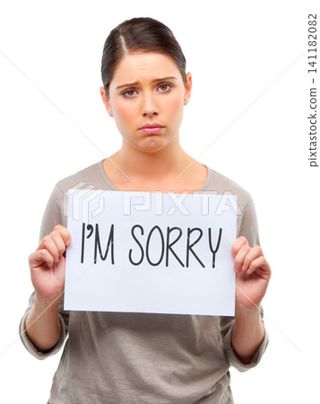 Sad, portrait and woman with Im sorry poster in studio with mistake, fail or regret on white background. Apology, face and female model frown with banner, announcement or broken heart presentation Sad, portrait and woman with Im sorry poster in studio with mistake, fail or regret on white background. Apology, face and female model frown with banner, announcement or broken heart presentation 141182082