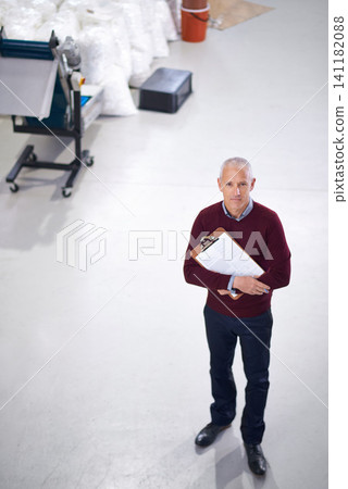 Manager, factory and portrait for inspection, production and industry for logistics and distribution. Mature man with clipboard for maintenance and quality control for supply chain and stock Manager, factory and portrait for inspection, production and industry for logistics and distribution. Mature man with clipboard for maintenance and quality control for supply chain and stock 141182088