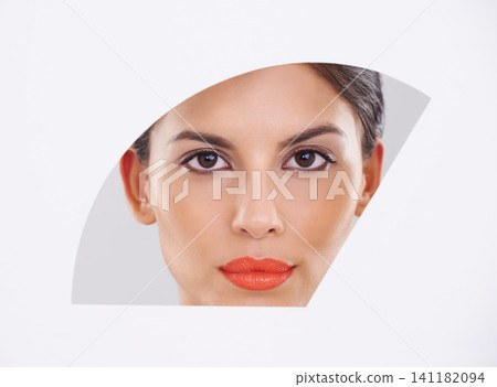 Woman, portrait and cosmetics in a studio for makeup, skincare and dermatology for change. Face of a model with beauty and foundation in art deco, closeup and creative shape on a white background Woman, portrait and cosmetics in a studio for makeup, skincare and dermatology for change. Face of a model with beauty and foundation in art deco, closeup and creative shape on a white background 141182094