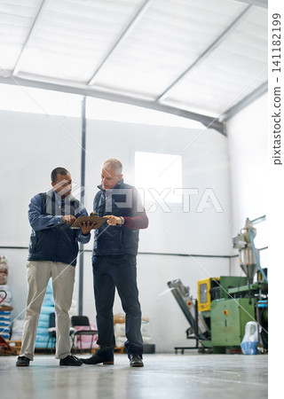 Warehouse, clipboard and business men with checklist for retail stock, cargo or quality control inspection. Ecommerce, supply chain and factory team with logistics, planning or brainstorming solution Warehouse, clipboard and business men with checklist for retail stock, cargo or quality control inspection. Ecommerce, supply chain and factory team with logistics, planning or brainstorming solution 141182199