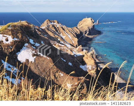View of Cape Kamui from the observation deck on the Shakotan Peninsula in Hokkaido during winter. View of Cape Kamui from the observation deck on the Shakotan Peninsula in Hokkaido during winter. 141182623