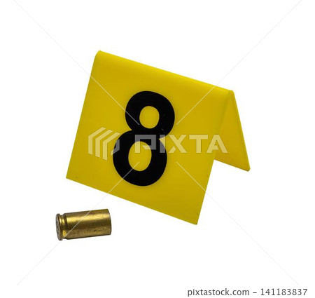 A 9mm cartridge case at the crime scene with a yellow marker number 8 installed nearby. Transparent background 141183837