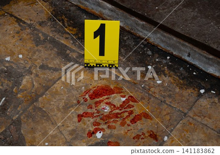 Bloody Boot Print on Floor with Evidence Marker at Crime Scene Bloody Boot Print on Floor with Evidence Marker at Crime Scene 141183862