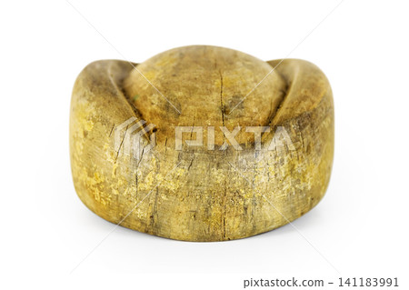 Antique millinery form for shaping pillbox hats. Vintage wooden block used in hat making. Craftsmanship, old professions, artisan work concept. Isolated on white background. Copy space Antique millinery form for shaping pillbox hats. Vintage wooden block used in hat making. Craftsmanship, old professions, artisan work concept. Isolated on white background. Copy space 141183991