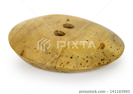 Antique millinery form for shaping wide brim for hats. Vintage wooden block used in hat making. Craftsmanship, old professions, artisan work concept. Isolated on white background. Copy space Antique millinery form for shaping wide brim for hats. Vintage wooden block used in hat making. Craftsmanship, old professions, artisan work concept. Isolated on white background. Copy space 141183993