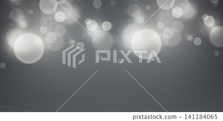 Abstract grey background displaying soft glowing bokeh light effects Abstract grey background displaying soft glowing bokeh light effects 141184065