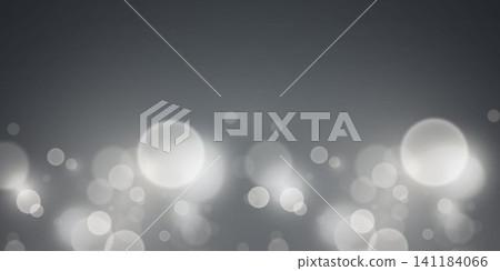 Grey background displaying soft, shimmering bokeh effect lights at the bottom Grey background displaying soft, shimmering bokeh effect lights at the bottom 141184066