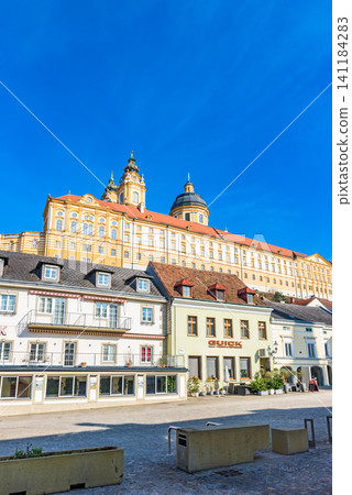 The magnificent Melk Abbey, a UNESCO World Heritage Site in the Wachau Valley Cultural Landscape, against a clear blue sky – a typical Austrian landscape. The magnificent Melk Abbey, a UNESCO World Heritage Site in the Wachau Valley Cultural Landscape, against a clear blue sky – a typical Austrian landscape. 141184283