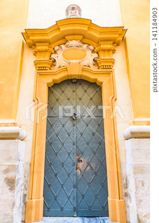 The beautifully decorated Baroque doors of Melk Abbey, a UNESCO World Heritage Site and part of the Wachau Valley Cultural Landscape. The beautifully decorated Baroque doors of Melk Abbey, a UNESCO World Heritage Site and part of the Wachau Valley Cultural Landscape. 141184903