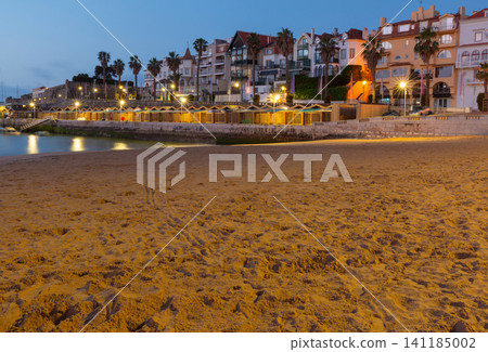 Sandy Beach and Waterfront Promenade at Blue Hour in Cascais Portugal Sandy Beach and Waterfront Promenade at Blue Hour in Cascais Portugal 141185002