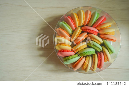 Macarons placed on wood grain Macarons placed on wood grain 141185542