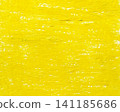 Abstract background with yellow crayon drawing texture. Yellow crayon stroke texture on paper. 141185686