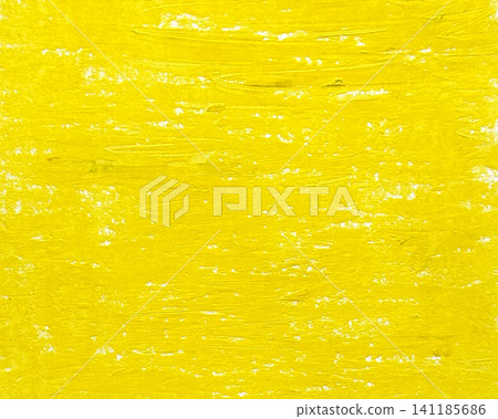 Abstract background with yellow crayon drawing texture. Yellow crayon stroke texture on paper. 141185686