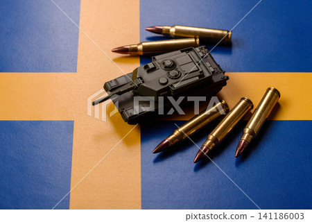 A tank on the Sweden flag as a conceptual backdrop representing Europe's defense A tank on the Sweden flag as a conceptual backdrop representing Europe's defense 141186003