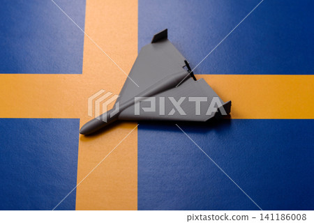 A Shahed drone featuring a prohibition symbol on the Sweden flag, conceptual background for defense A Shahed drone featuring a prohibition symbol on the Sweden flag, conceptual background for defense 141186008